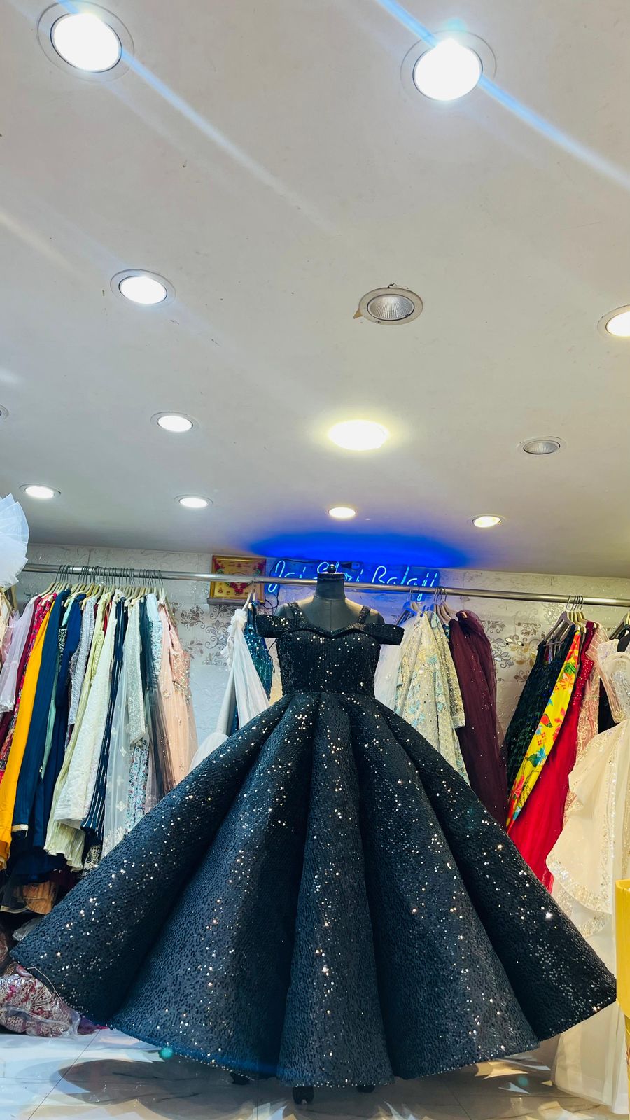 Dramatic Black Sequin Ball Gown with Off-Shoulder Neckline & Voluminous Pleated Skirt – Gala & Reception Wear