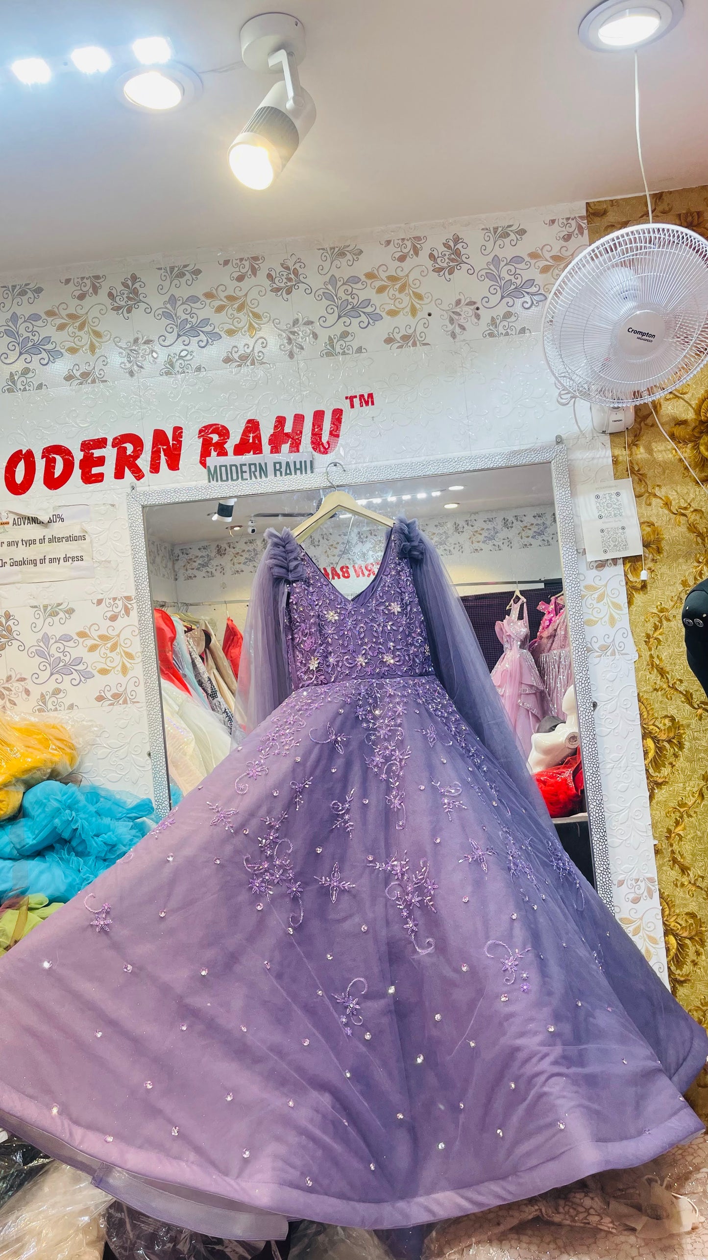 Purple Heavily Embellished Evening Gown with Ruffled Tulle Sleeves and Floral Sequin Work