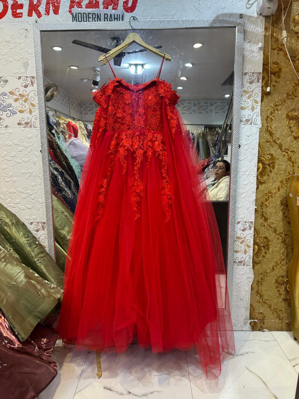 Radiant Red Net Gown with Heavy Floral Embroidery & Floor-Length Cape Sleeves – Cocktail & Party Wear