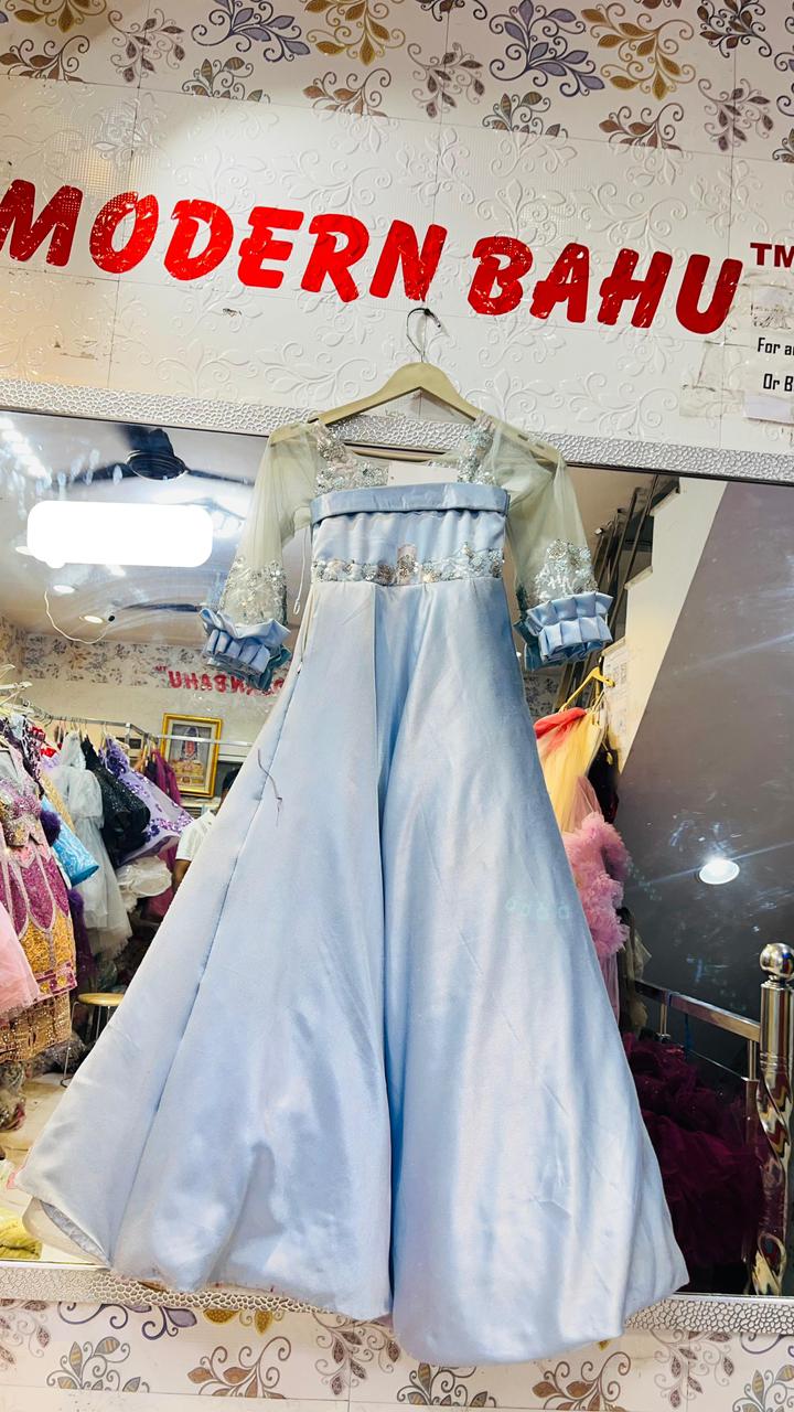 Elegant Ice Blue Satin Ball Gown with Sheer Embroidered Sleeves & Ruffled Cuffs – Luxury Party Wear