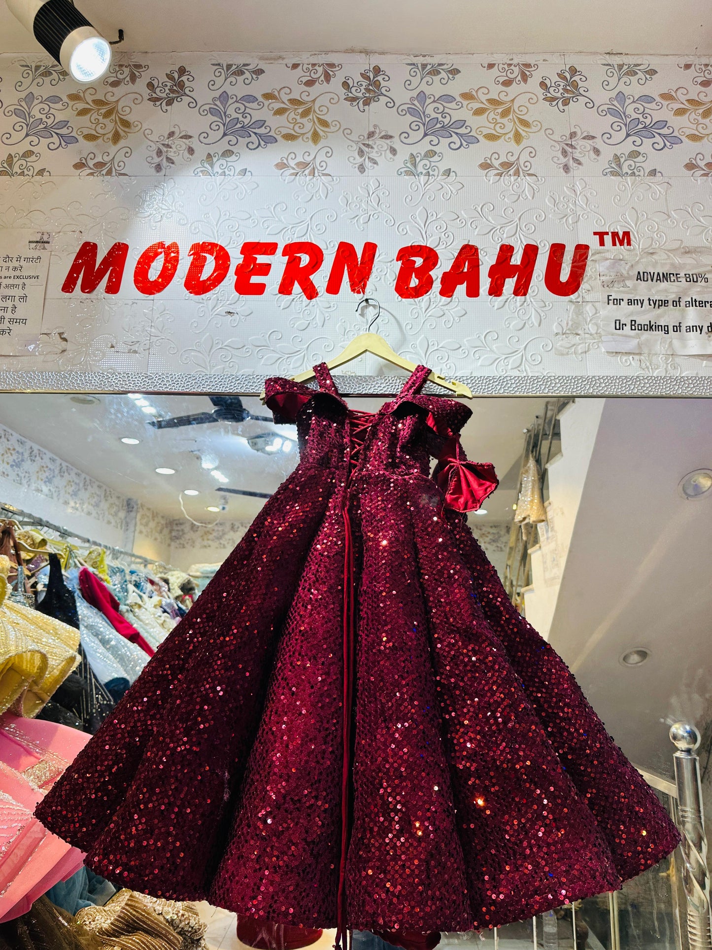 Glamorous Wine Red All-Over Sequin Ball Gown with Statement Bow Sleeve