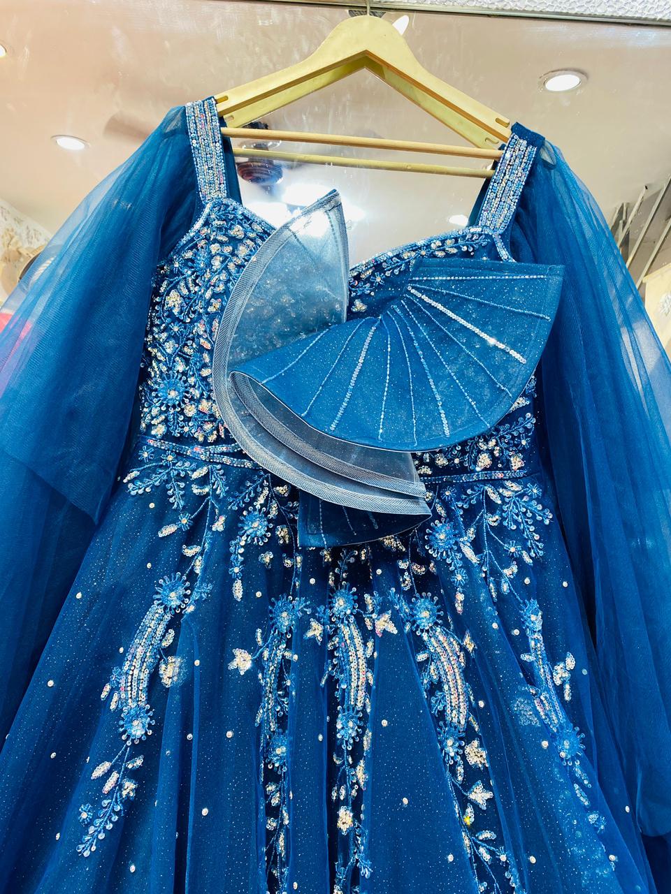 Majestic Royal Blue Tulle Ball Gown with Sheer Cape Sleeves & Avant-Garde Fan Detail – Designer Evening Wear