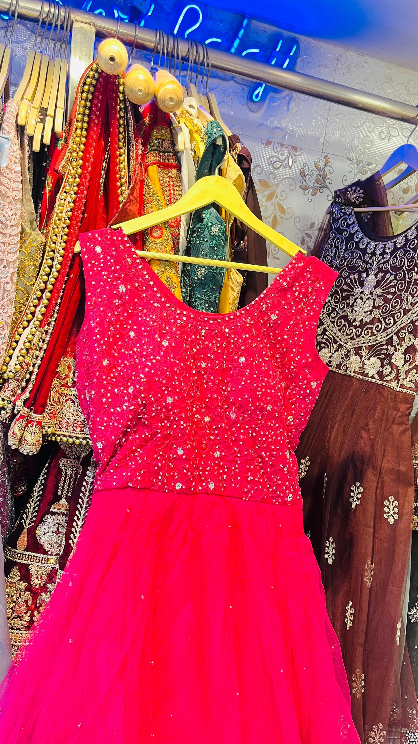 Vibrant Hot Pink Tulle Gown with Dense Beadwork Bodice – Statement Party Wear