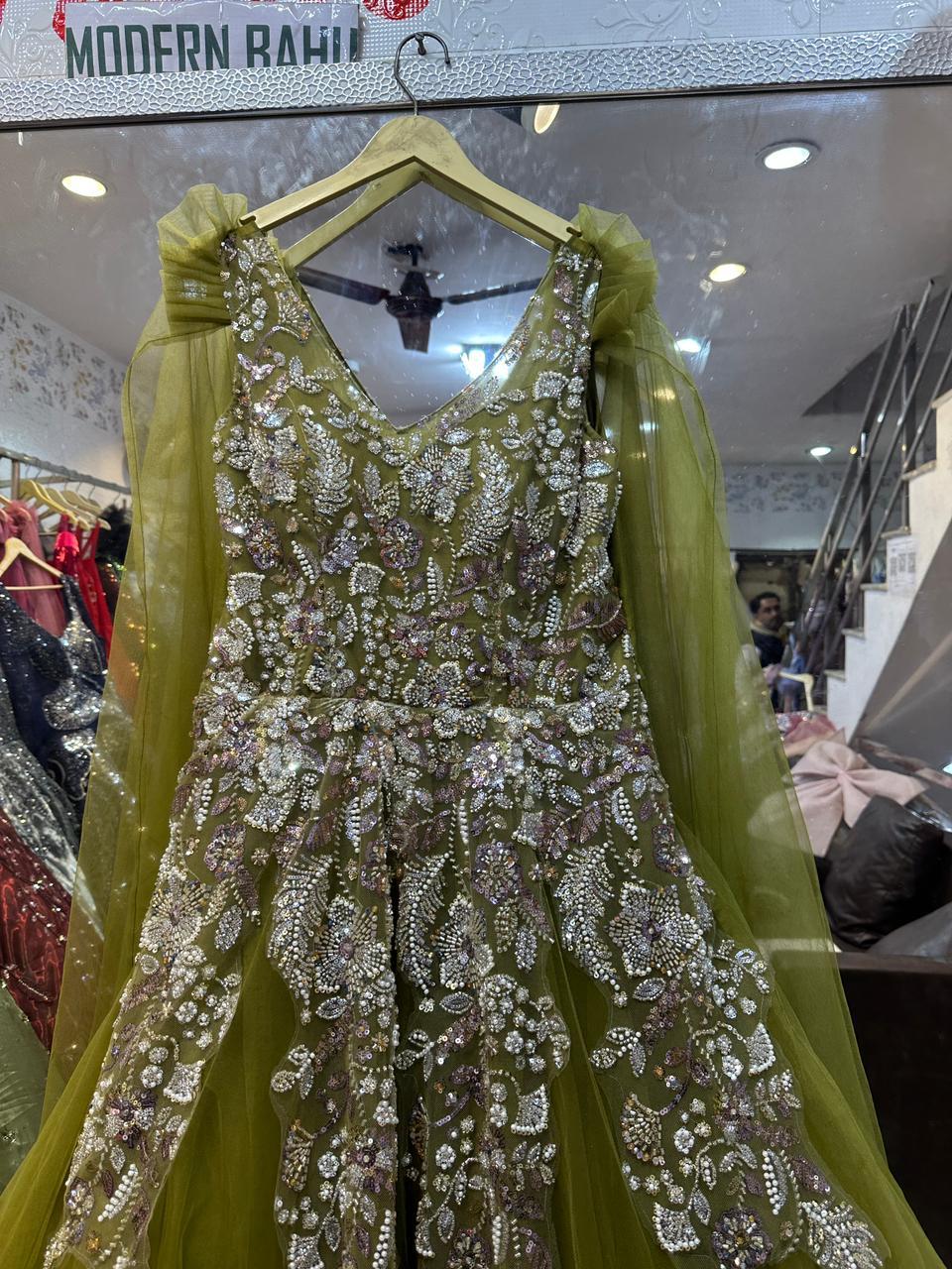 Olive Green Heavy Embroidered Cape Gown – Floral Sequin Net Party Dress with Floor-Length Drapes