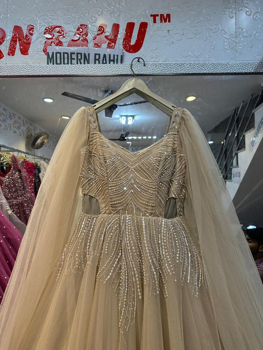 Ethereal Champagne Gold Gown with Floor-Length Cape Sleeves & Waist Cut-Outs – Reception & Cocktail Wear