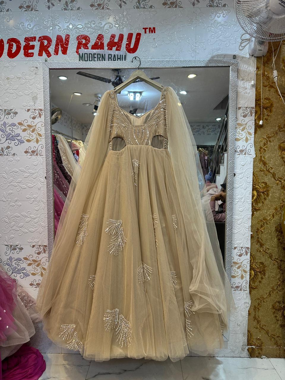 Ethereal Champagne Gold Gown with Floor-Length Cape Sleeves & Waist Cut-Outs – Reception & Cocktail Wear