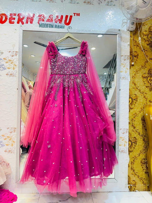 Vibrant Fuchsia Pink Net Gown with Ruffled Shoulders & Crystal Floral Embroidery – Party & Sangeet Wear