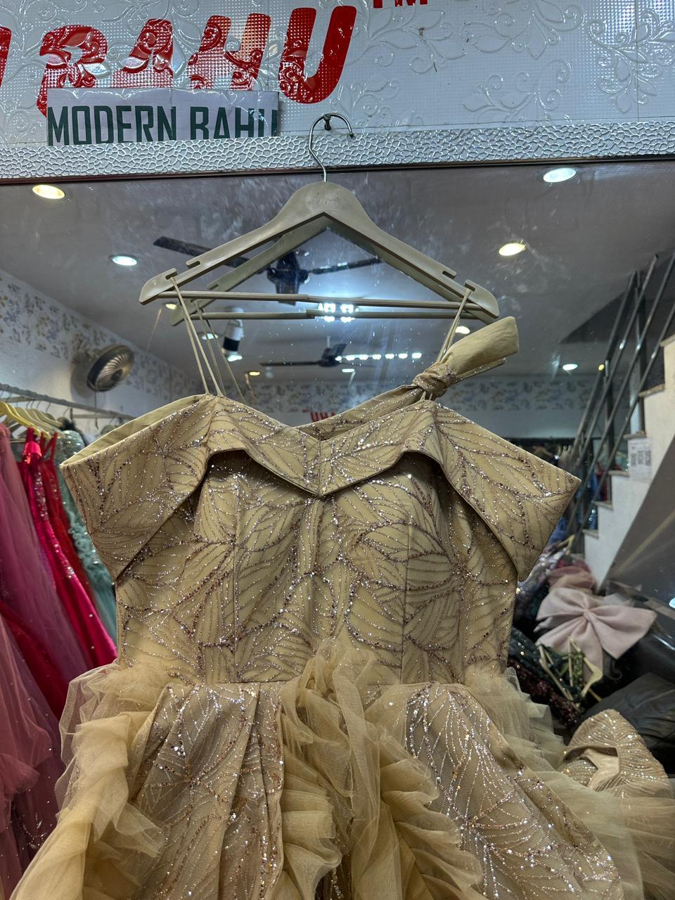 Sparkling Champagne Gold Gown with Ruffled Peplum Waist & Shoulder Bow – Modern Prom & Cocktail Wear