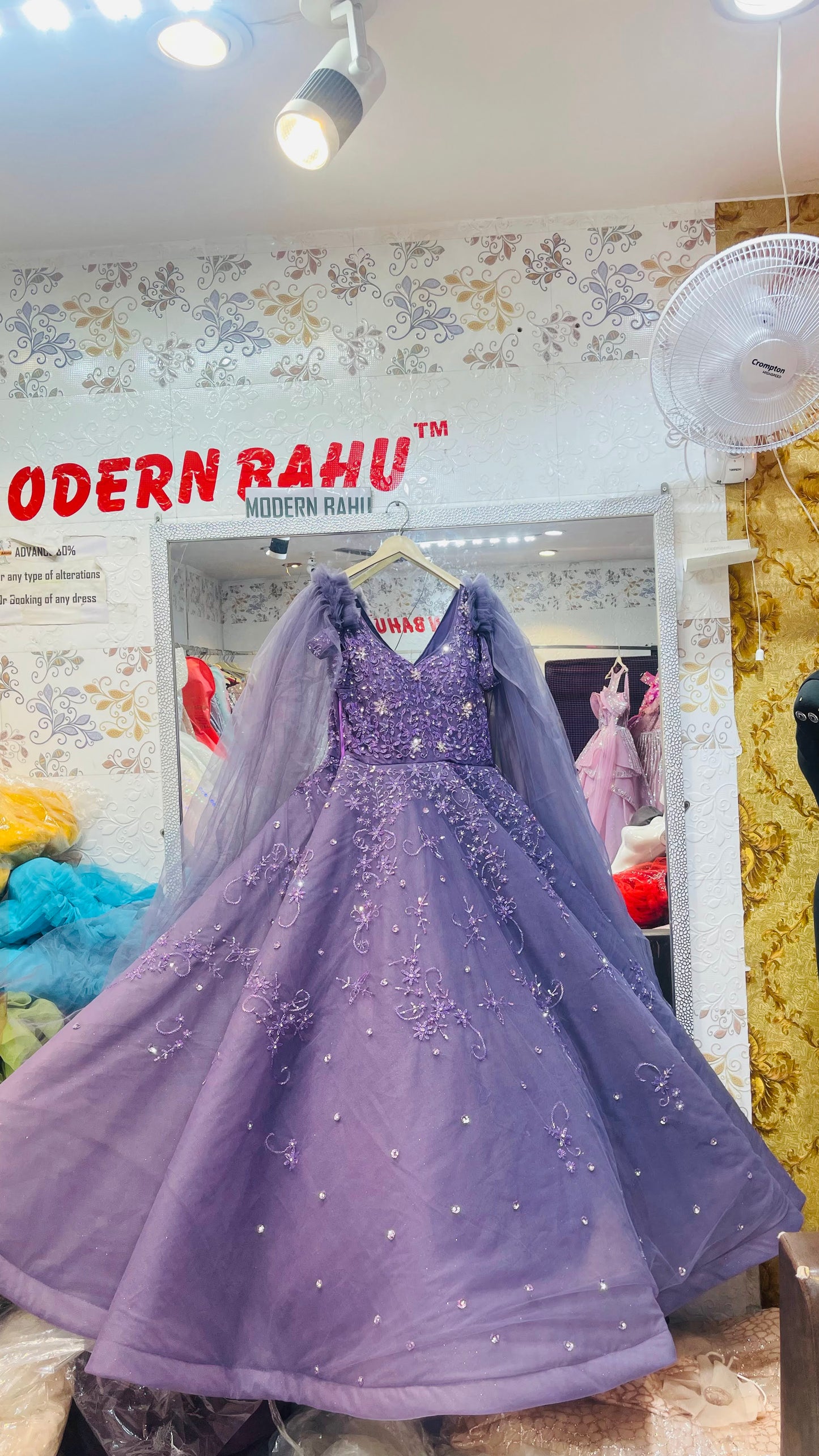 Purple Heavily Embellished Evening Gown with Ruffled Tulle Sleeves and Floral Sequin Work