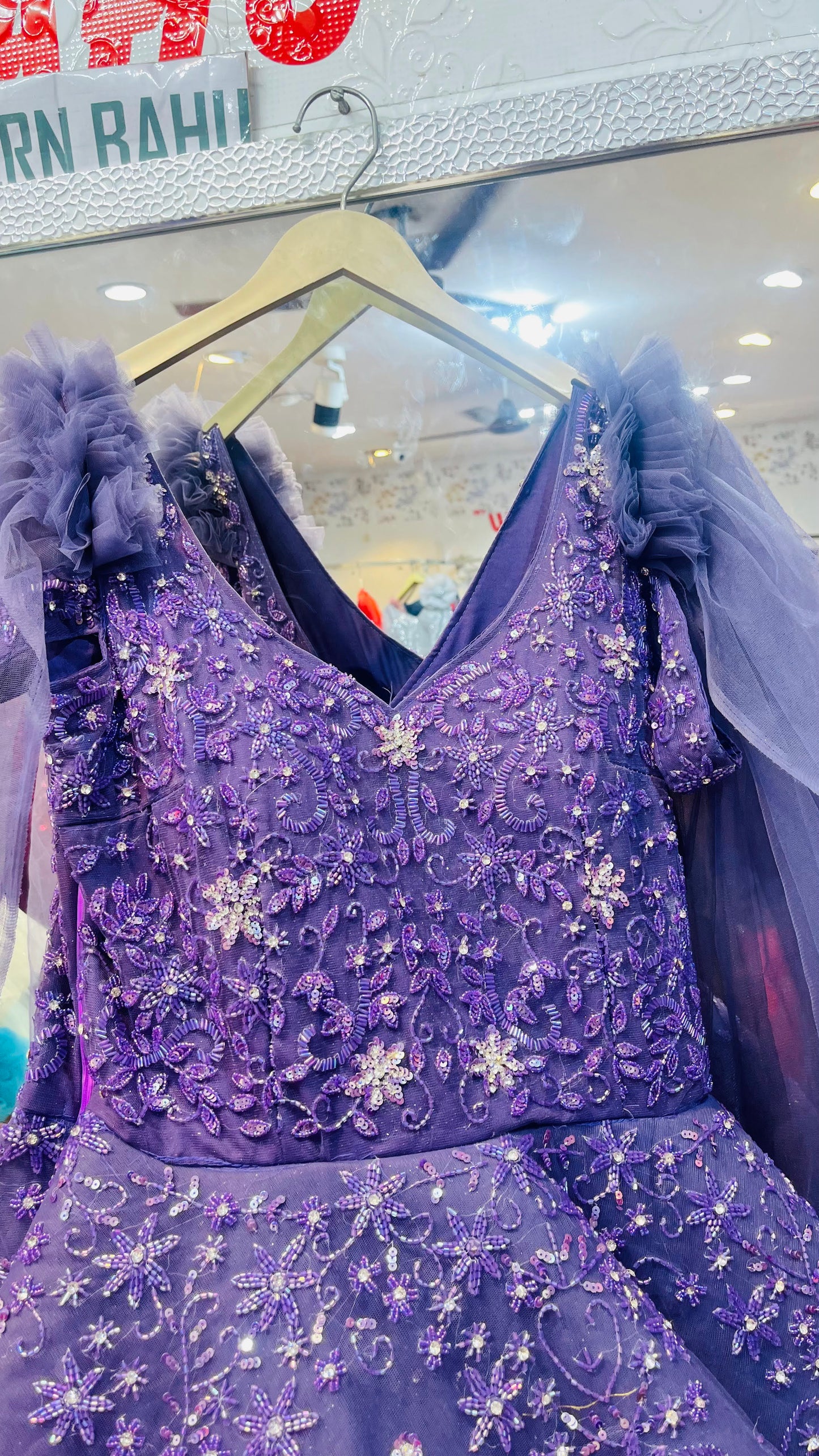 Purple Heavily Embellished Evening Gown with Ruffled Tulle Sleeves and Floral Sequin Work