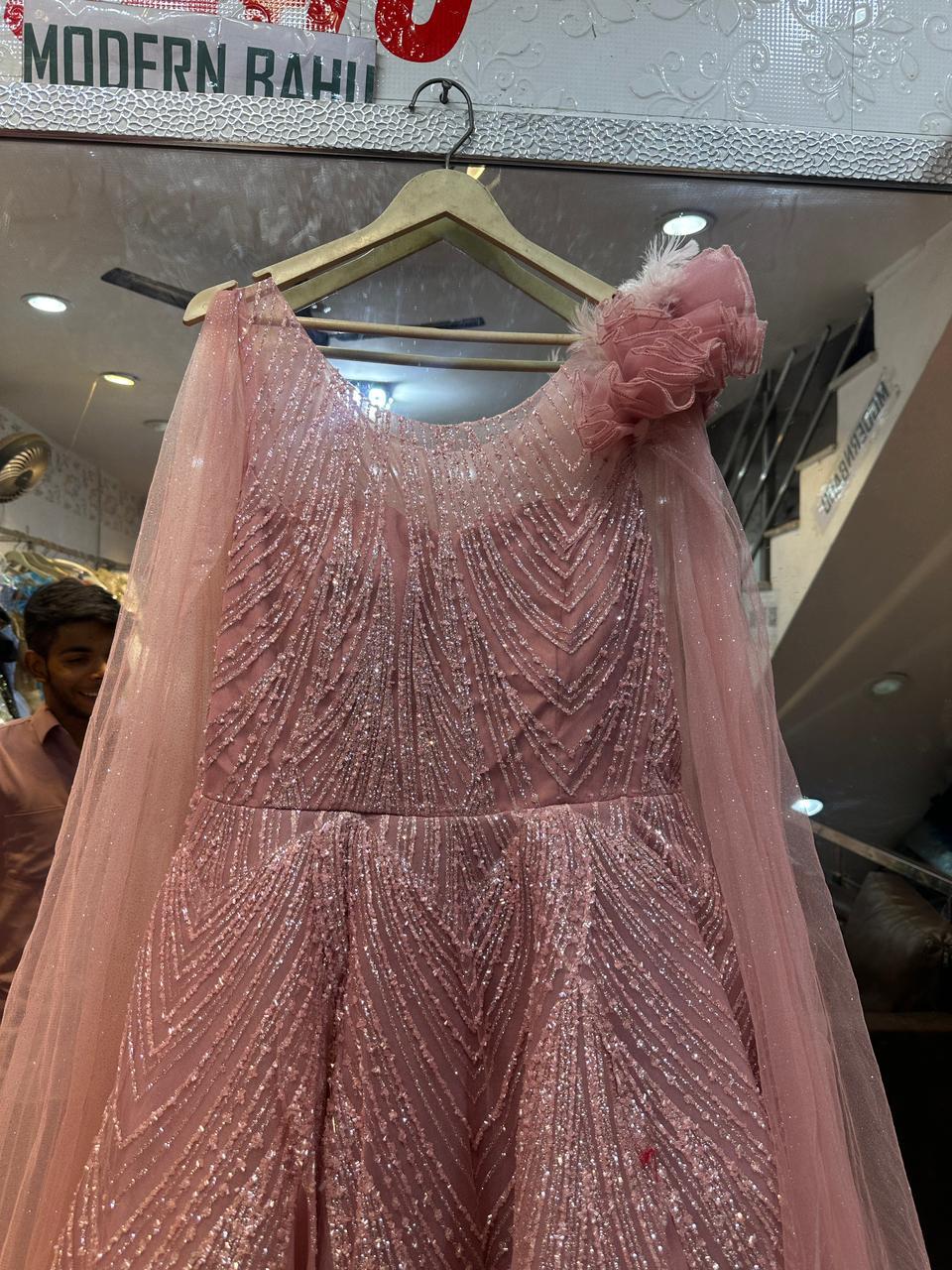 Radiant Dusty Pink Shimmer Gown with Cape Sleeves & 3D Shoulder Flower – Cocktail & Reception Wear