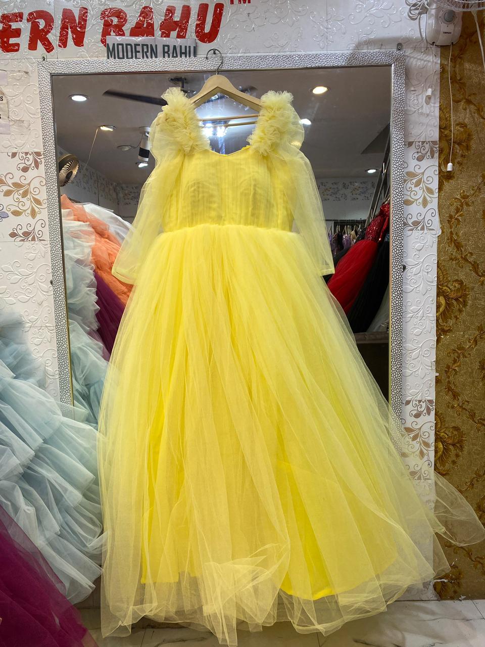 Radiant Sunshine Yellow Tulle Ball Gown with Ruffled Shoulders & Sheer Sleeves – Party & Haldi Wear