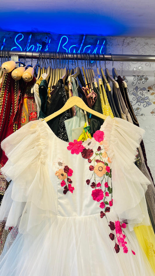 Whimsical White Tulle Ball Gown with Colorful Floral Embroidery & Ruffled Angel Sleeves – Garden Party Wear