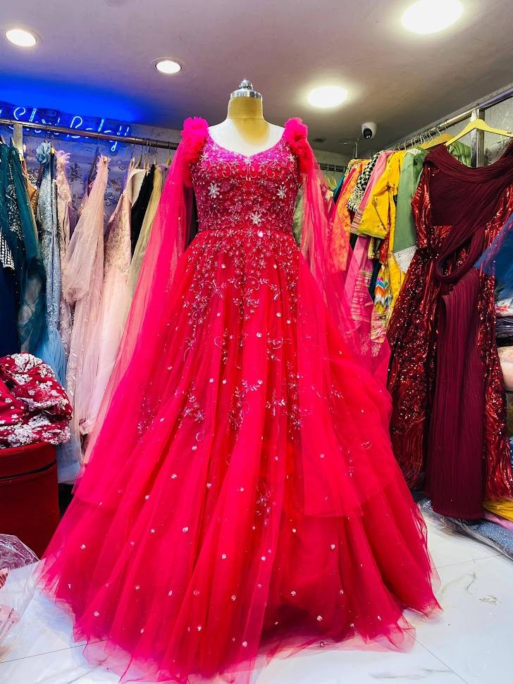 Designer Hot Pink Sequin Embellished Net Gown with Dramatic Cape Sleeves for Wedding & Reception