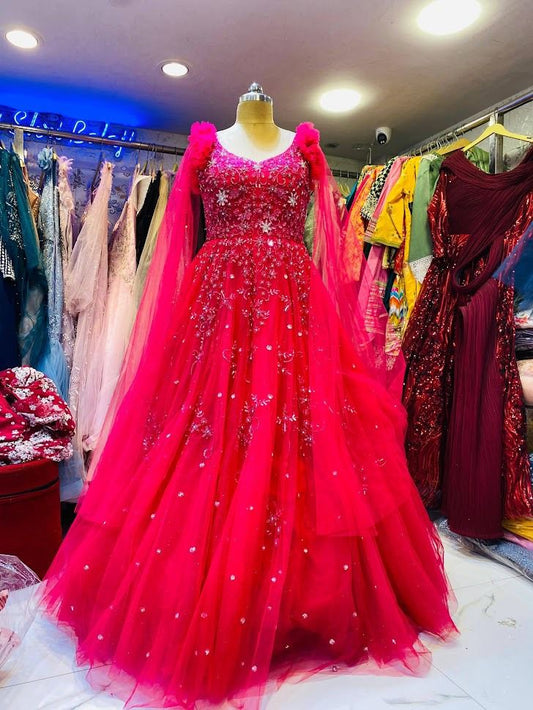 Designer Hot Pink Sequin Embellished Net Gown with Dramatic Cape Sleeves for Wedding & Reception
