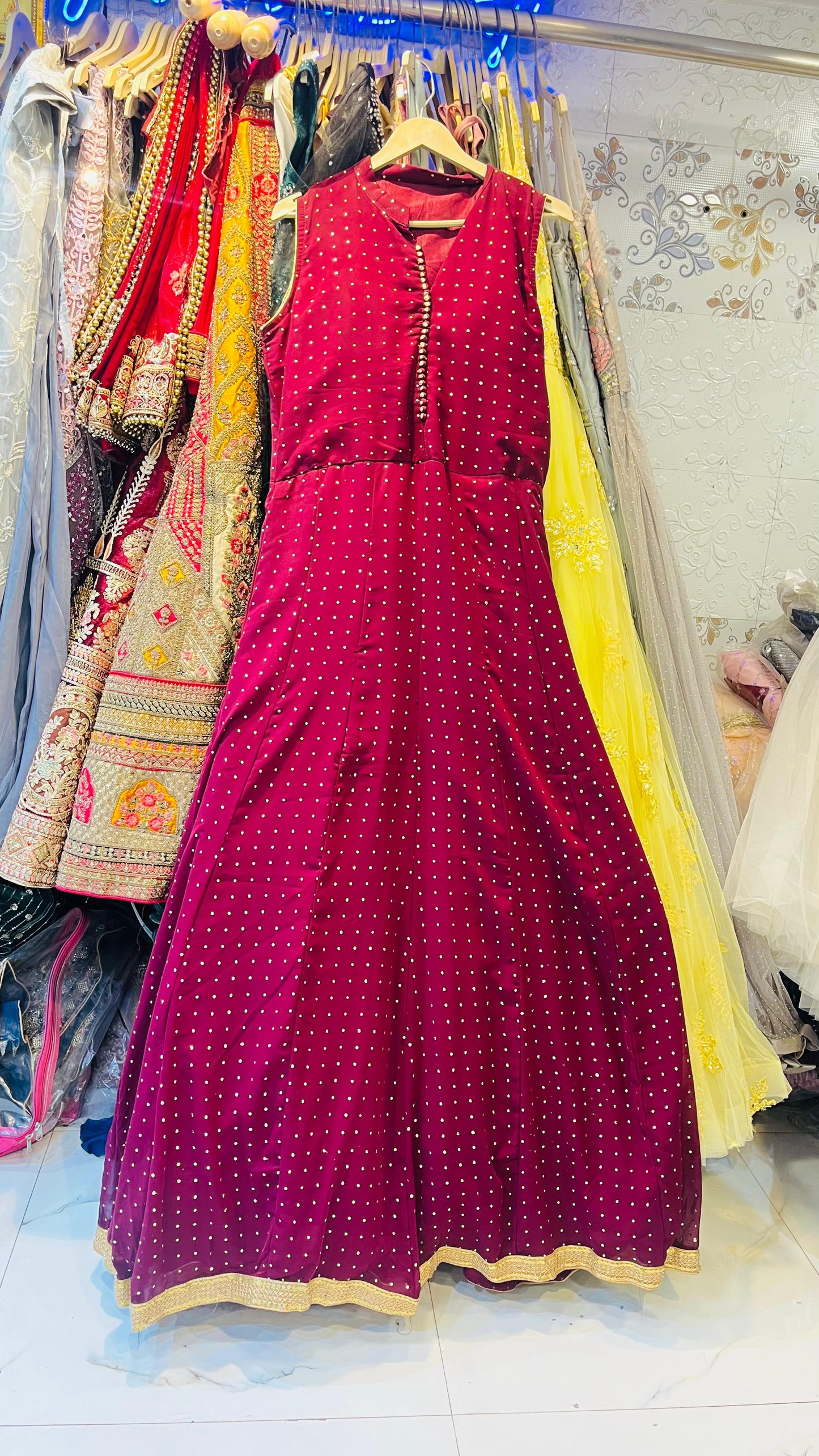 Elegant Maroon Georgette Maxi Gown with Golden Polka Dots & Chic Button Detail – Fusion Ethnic Wear