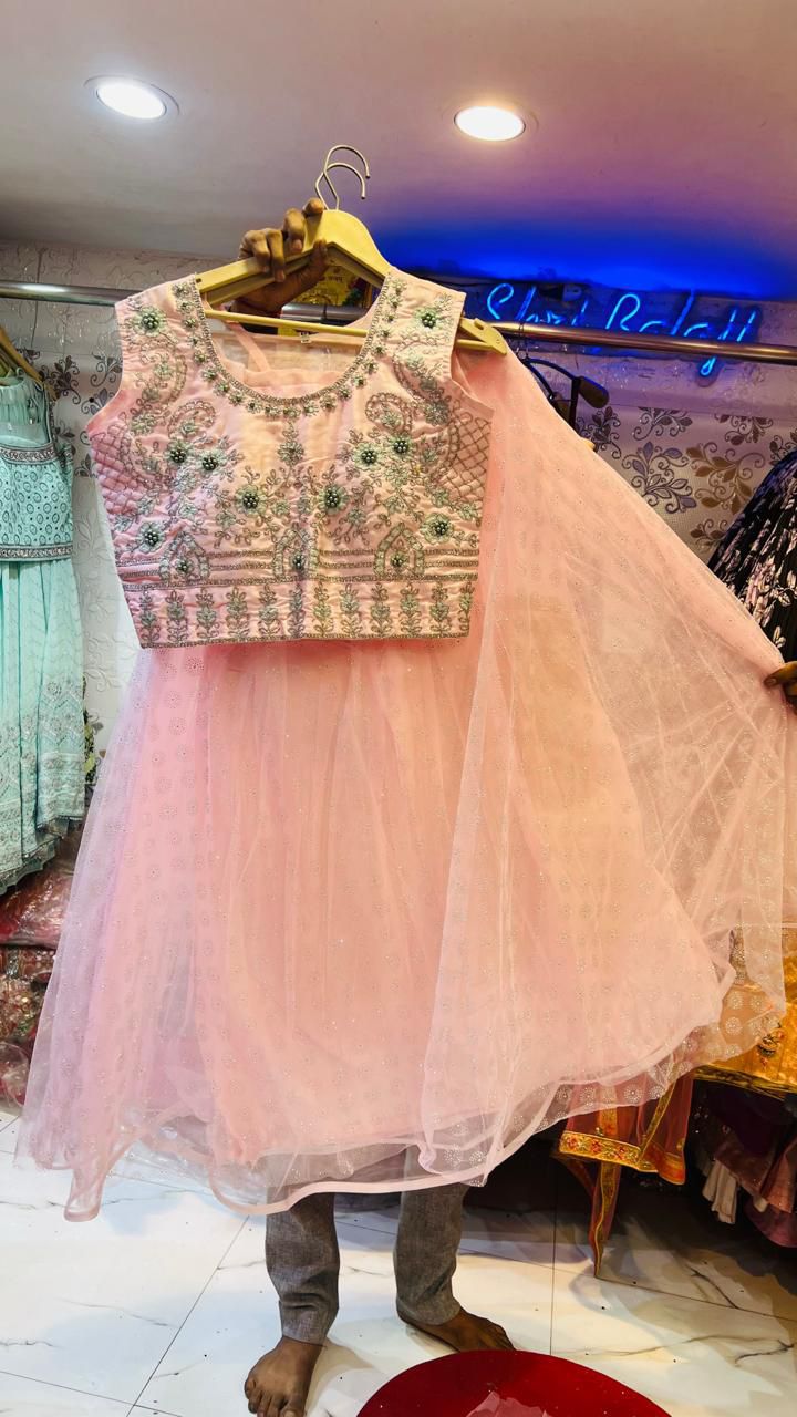 Chic Pastel Pink Net Lehenga Choli with Heavy Pearl & Green Bead Embellished Blouse