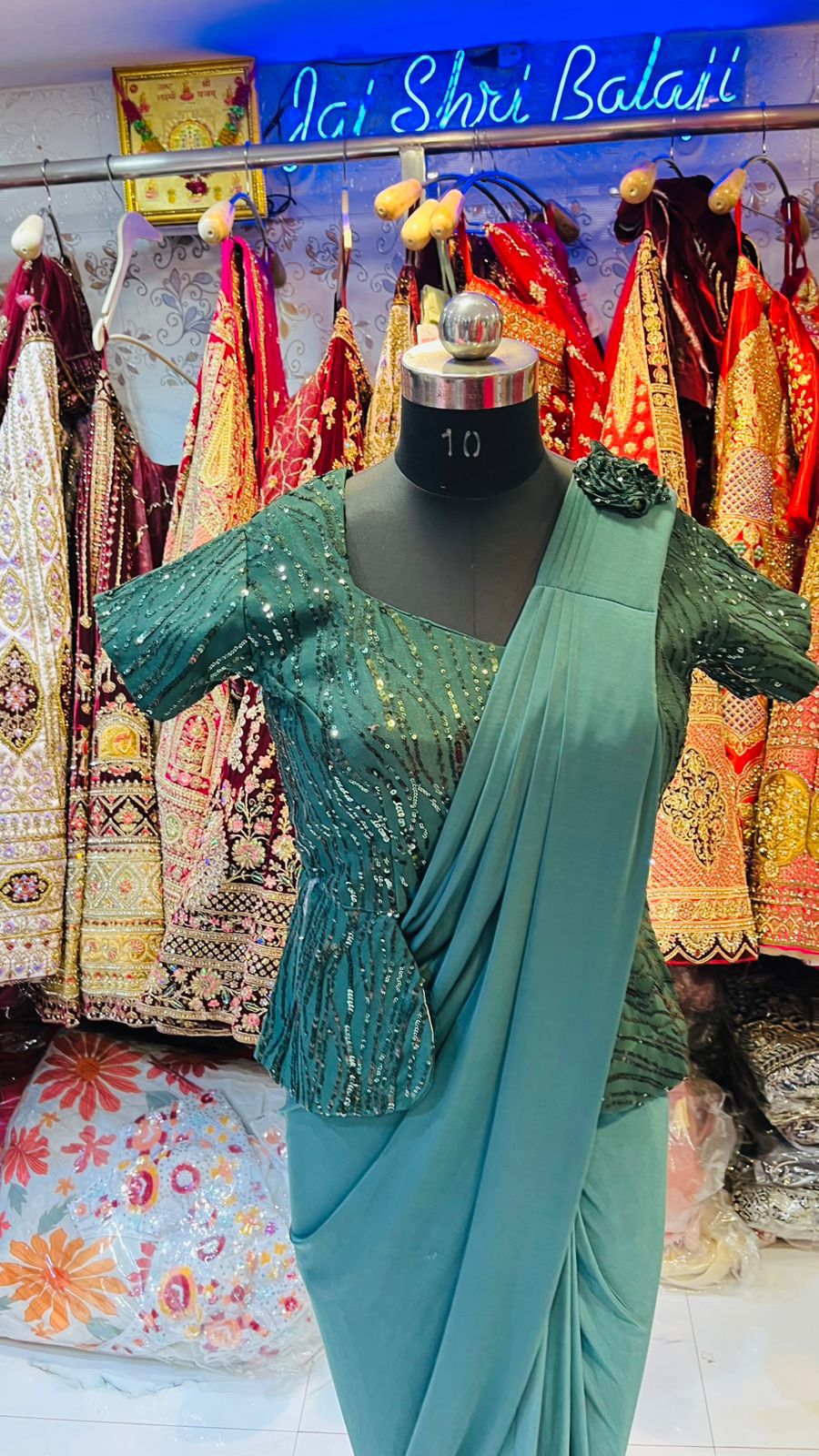 Teal Green Ready-to-Wear Saree Gown – Sequin Peplum Blouse with Pre-Draped Pallu & Shoulder Flower