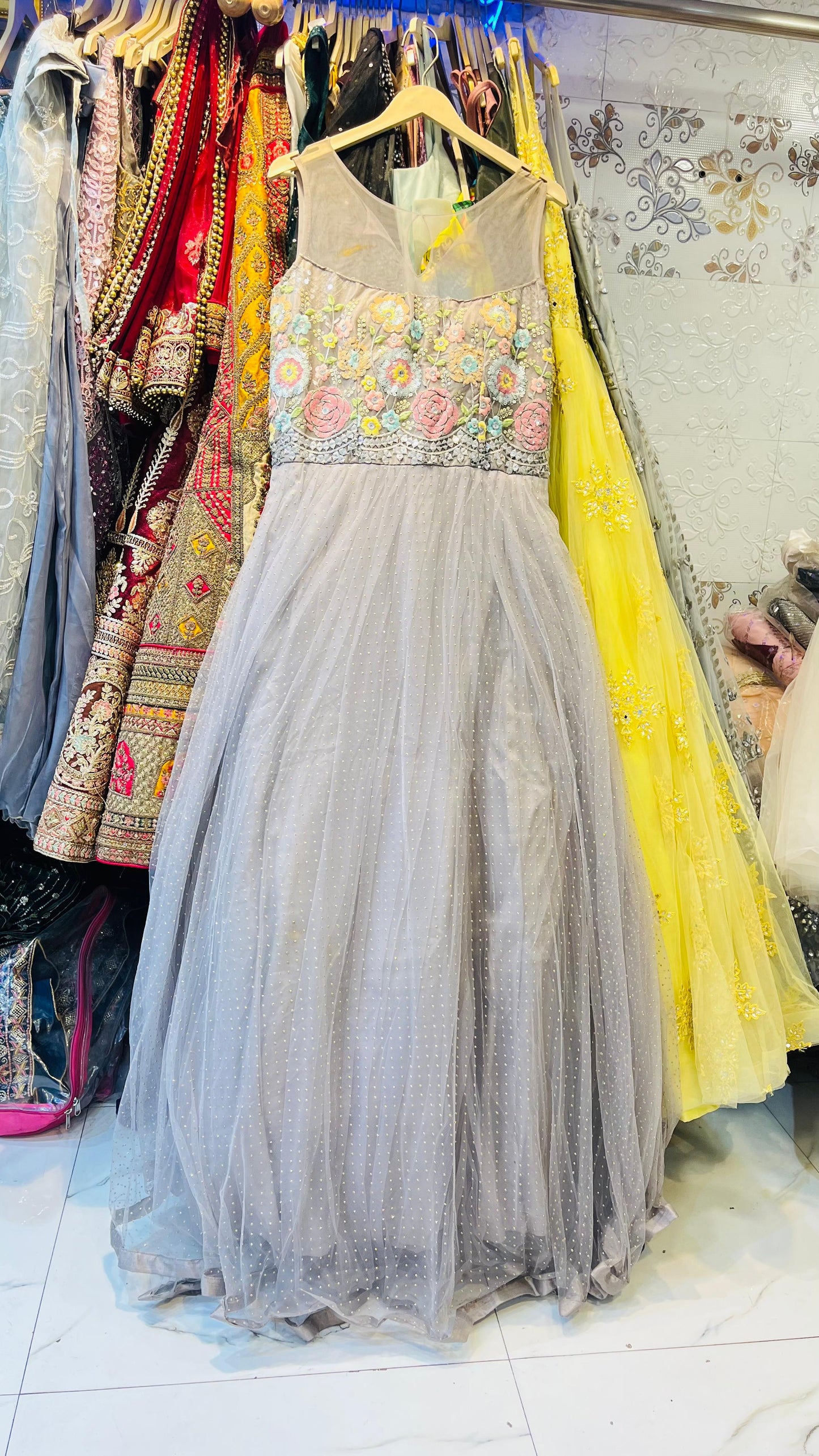 Chic Grey Tulle Gown with Pastel Floral Embroidery & Mirror Work Waist – Contemporary Party Wear