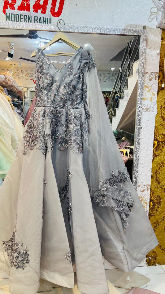 Elegant Silver-Grey Tulle Ball Gown with Intricate Floral Sequin Embroidery & Ruffled Shoulder Detail – Premium Evening Party Wear