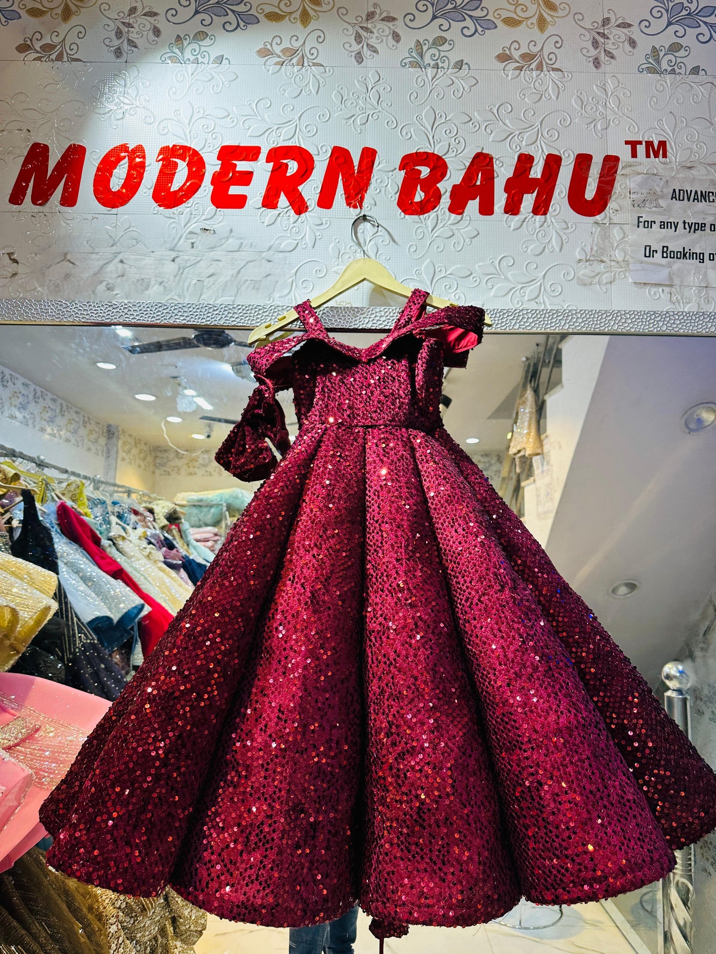 Glamorous Wine Red All-Over Sequin Ball Gown with Statement Bow Sleeve