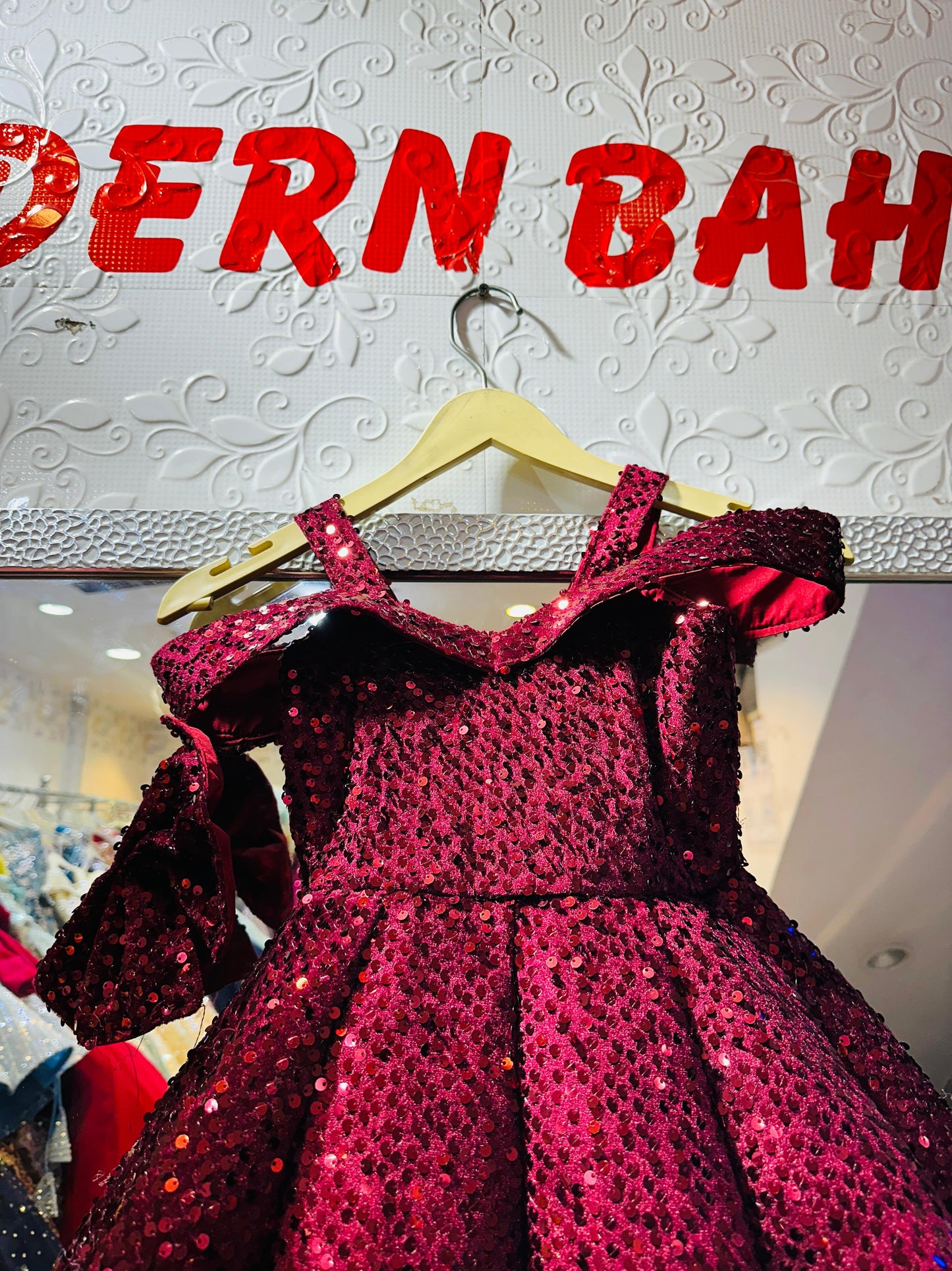Glamorous Wine Red All-Over Sequin Ball Gown with Statement Bow Sleeve