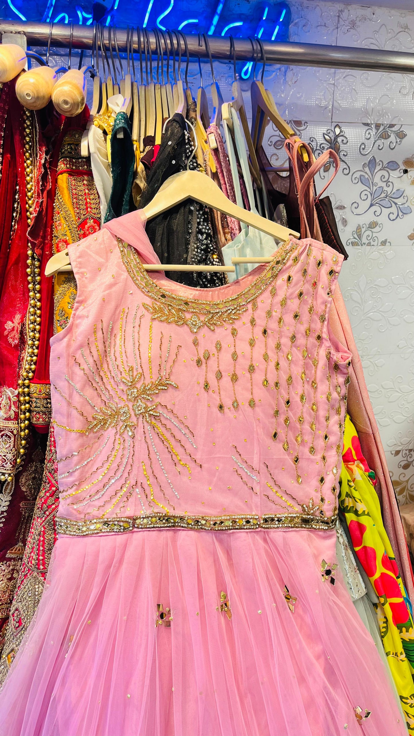 Charming Baby Pink Tulle Gown with Gold Sunburst Embroidery & Mirror Work Accents – Festive Party Wear