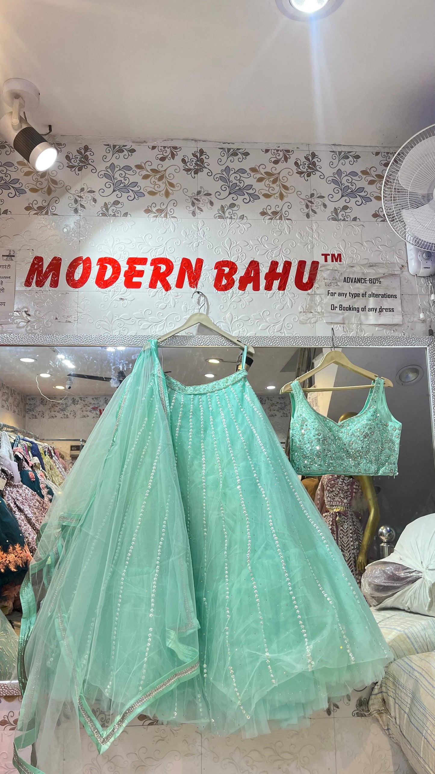 Glamorous Turquoise Blue Net Lehenga Choli with Heavy Silver Stone & Sequin Embroidery – Wear