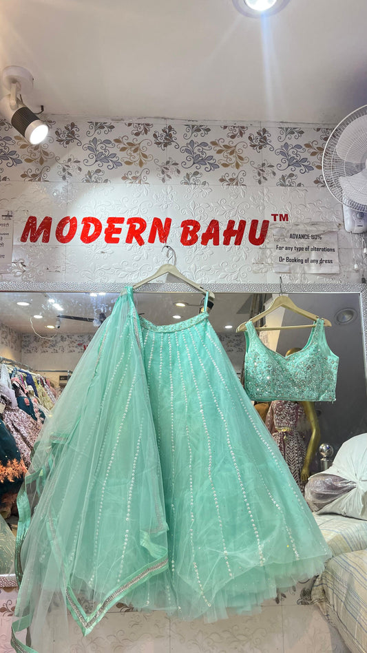 Glamorous Turquoise Blue Net Lehenga Choli with Heavy Silver Stone & Sequin Embroidery – Wear