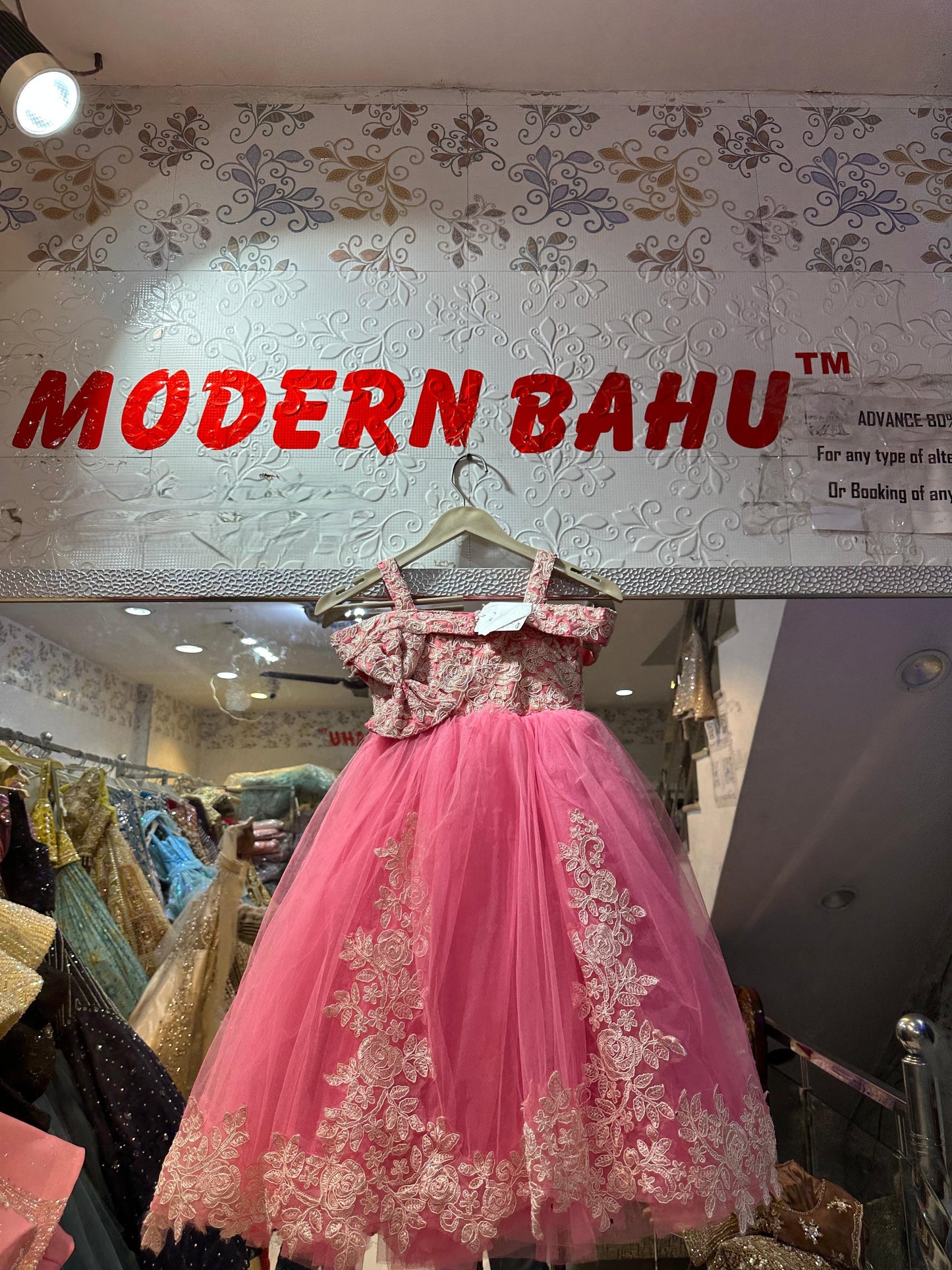 Pink Floral Embroidered Net Ball Gown with Statement Bow & Skirt Appliques