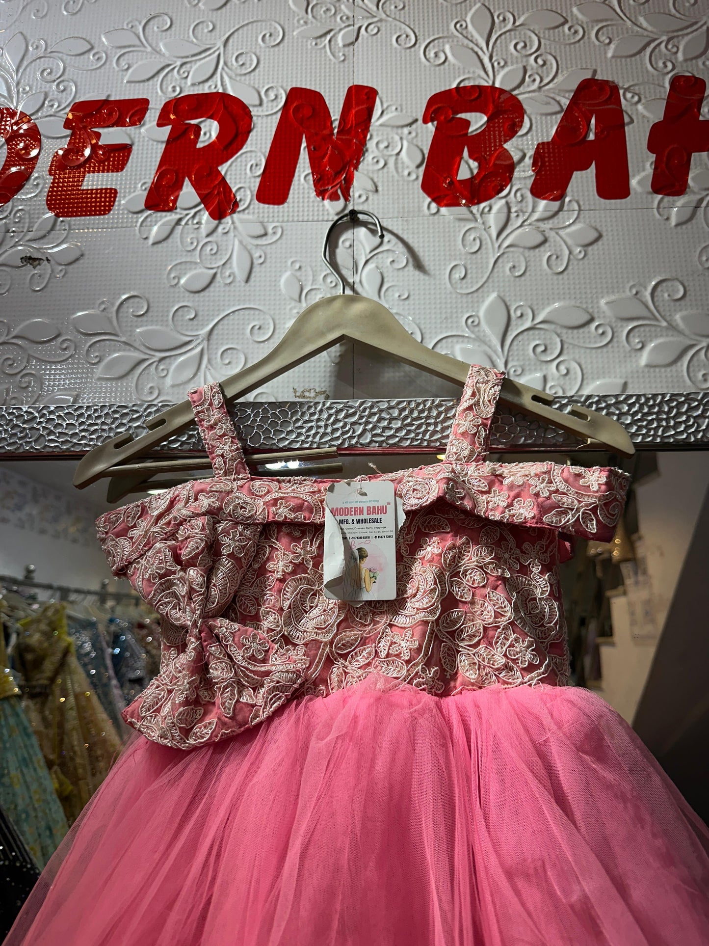 Pink Floral Embroidered Net Ball Gown with Statement Bow & Skirt Appliques