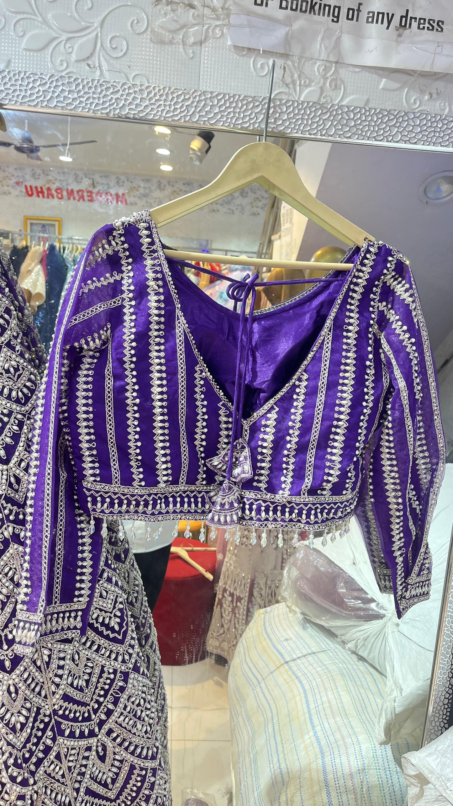 Royal Purple Net Lehenga Choli with Heavy Silver Geometric Embroidery & Long Sleeves – Party Wear