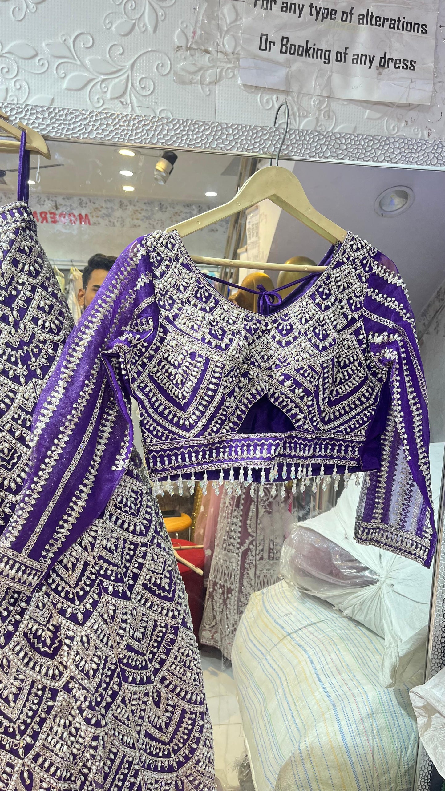 Royal Purple Net Lehenga Choli with Heavy Silver Geometric Embroidery & Long Sleeves – Party Wear