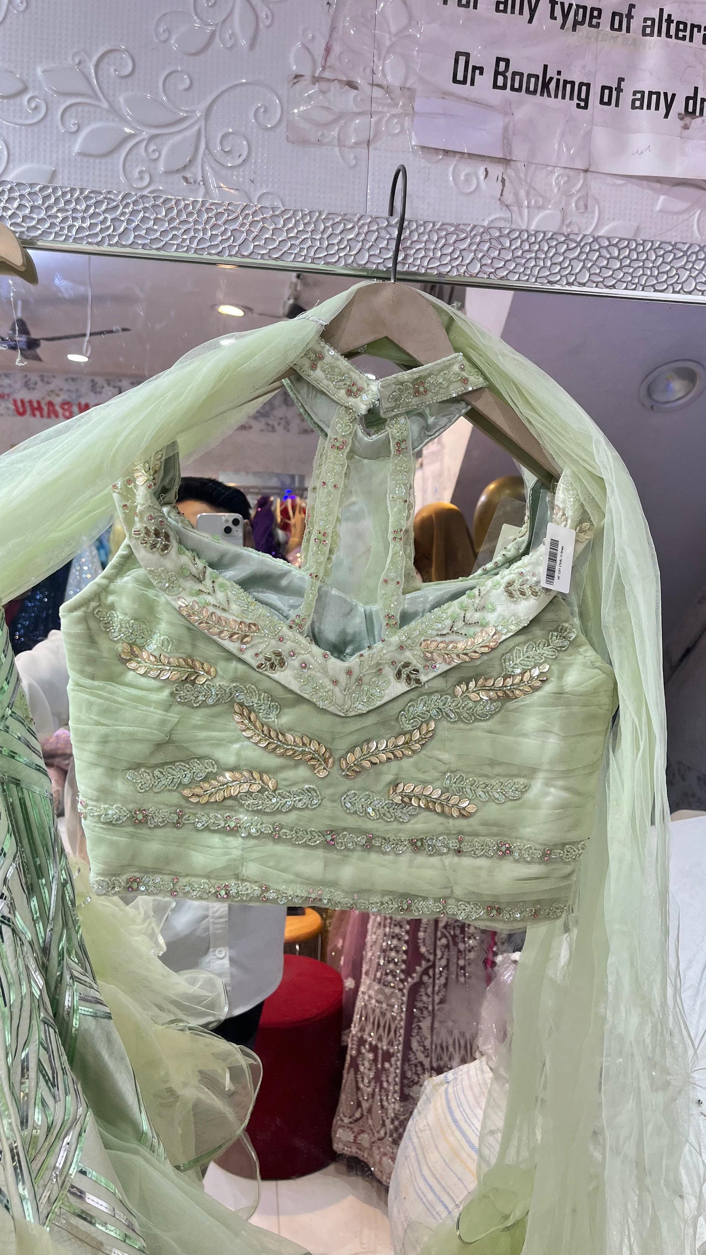 Trendy Mint Green Ruffled Lehenga Choli with Ruched High-Neck Blouse & Geometric Sequin Work – Party Wear