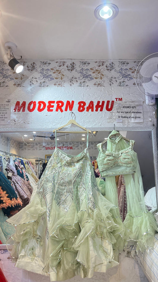 Trendy Mint Green Ruffled Lehenga Choli with Ruched High-Neck Blouse & Geometric Sequin Work – Party Wear