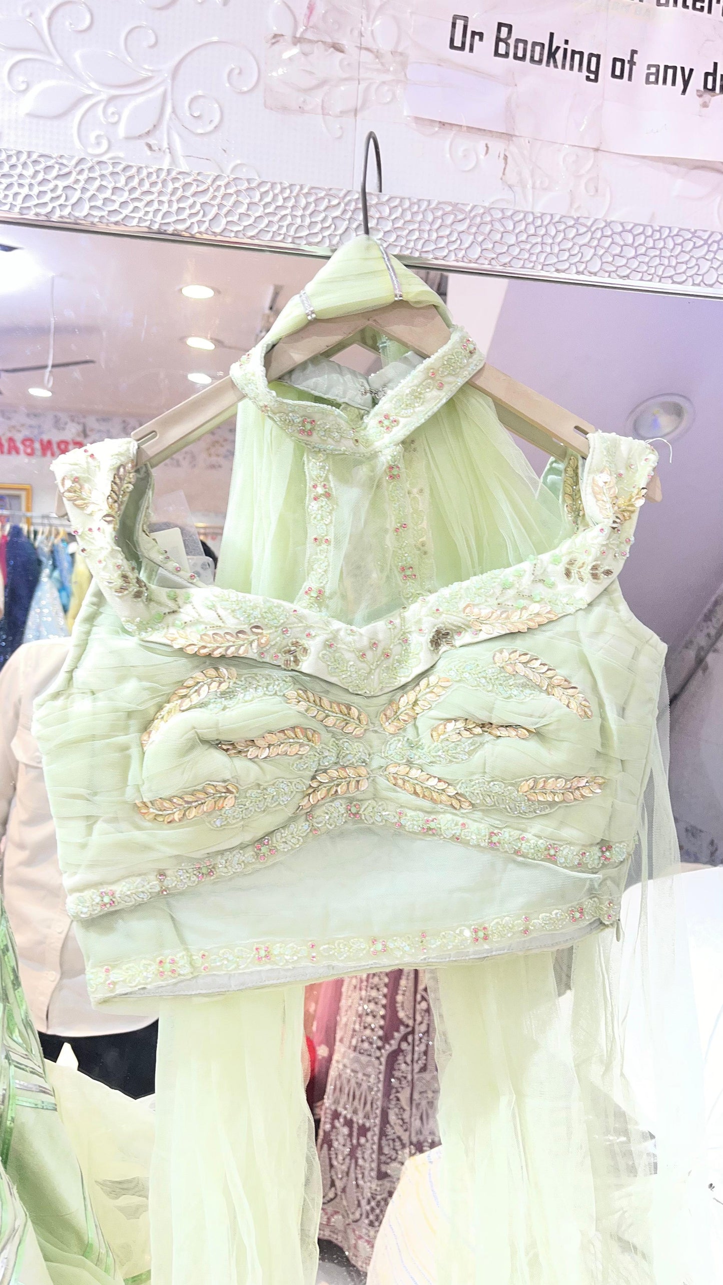 Trendy Mint Green Ruffled Lehenga Choli with Ruched High-Neck Blouse & Geometric Sequin Work – Party Wear