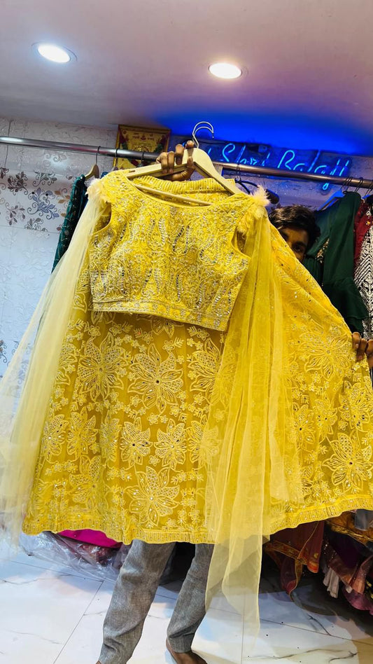 Bright Yellow Net Lehenga Choli with Floral Thread & Mirror Work