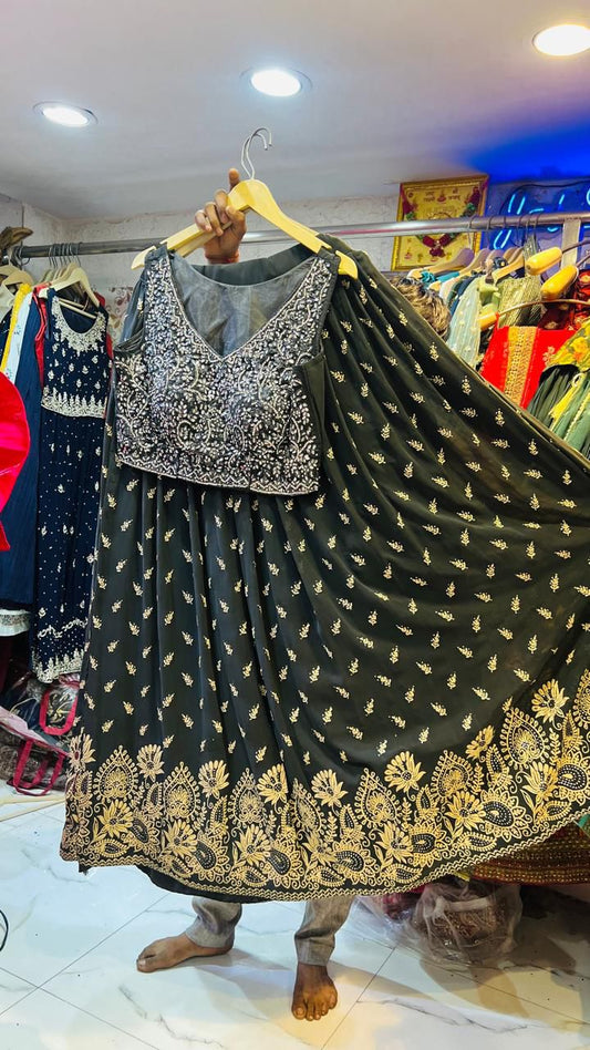 Glamorous Black Georgette Lehenga Choli with Silver Beaded Blouse & Heavy Gold Zari Border – Party Wear