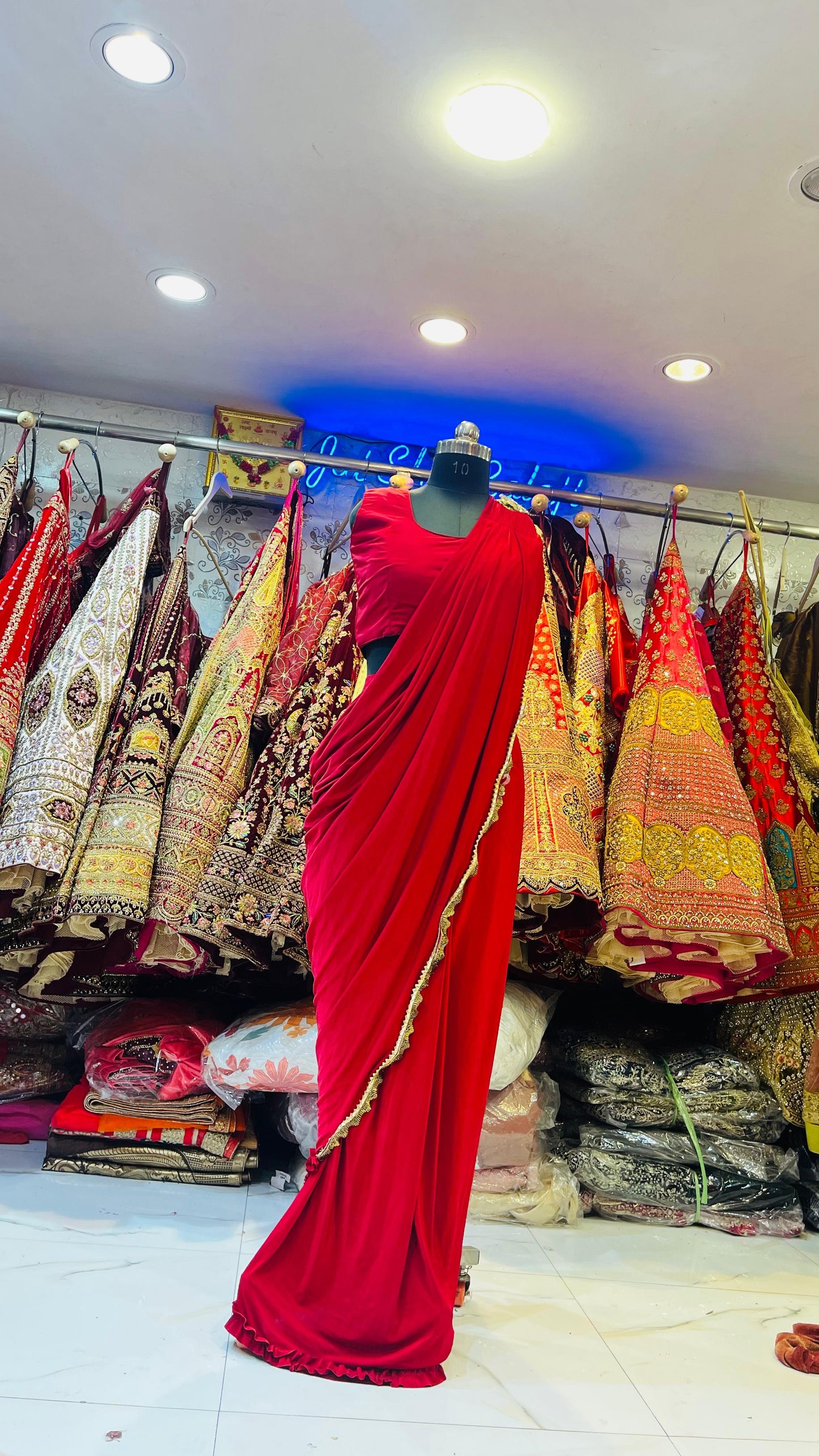 Elegant Red Saree with Intricate Lace Work – Festive & Wedding Wear
